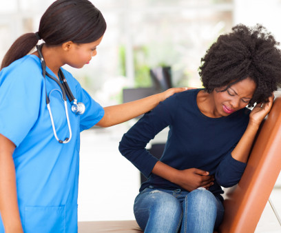 woman girl stomach cramps with nurse