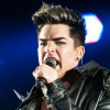 Adam Lambert in 2012 singing with British rock band Queen
