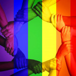 Cropped shot of unrecognizable people linking arms against a multi colored overlay
