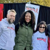 Emcees and event leaders on stage at AIDS Walk Philly 2023