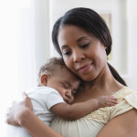 Mother holding her baby